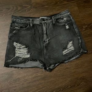 Black denim shorts.